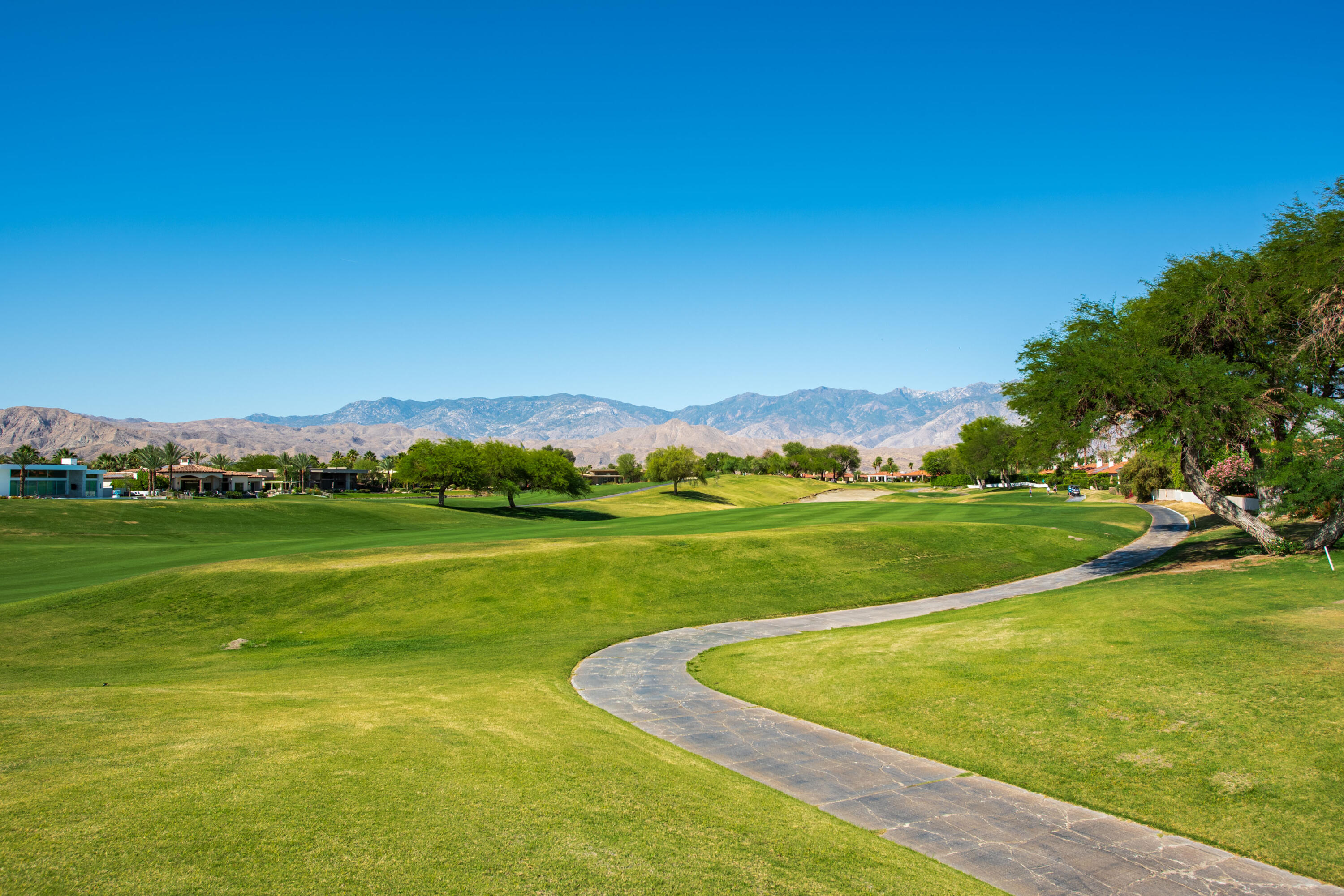 278 Loch Lomond Road Rancho Mirage, CA 92270 - Photo 48 of 49 a view of a golf course with a lake