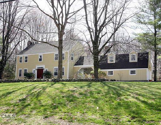 37 Linden Tree Road Wilton, CT 06897 - Photo 1 of 1 a front view of house with yard and green space