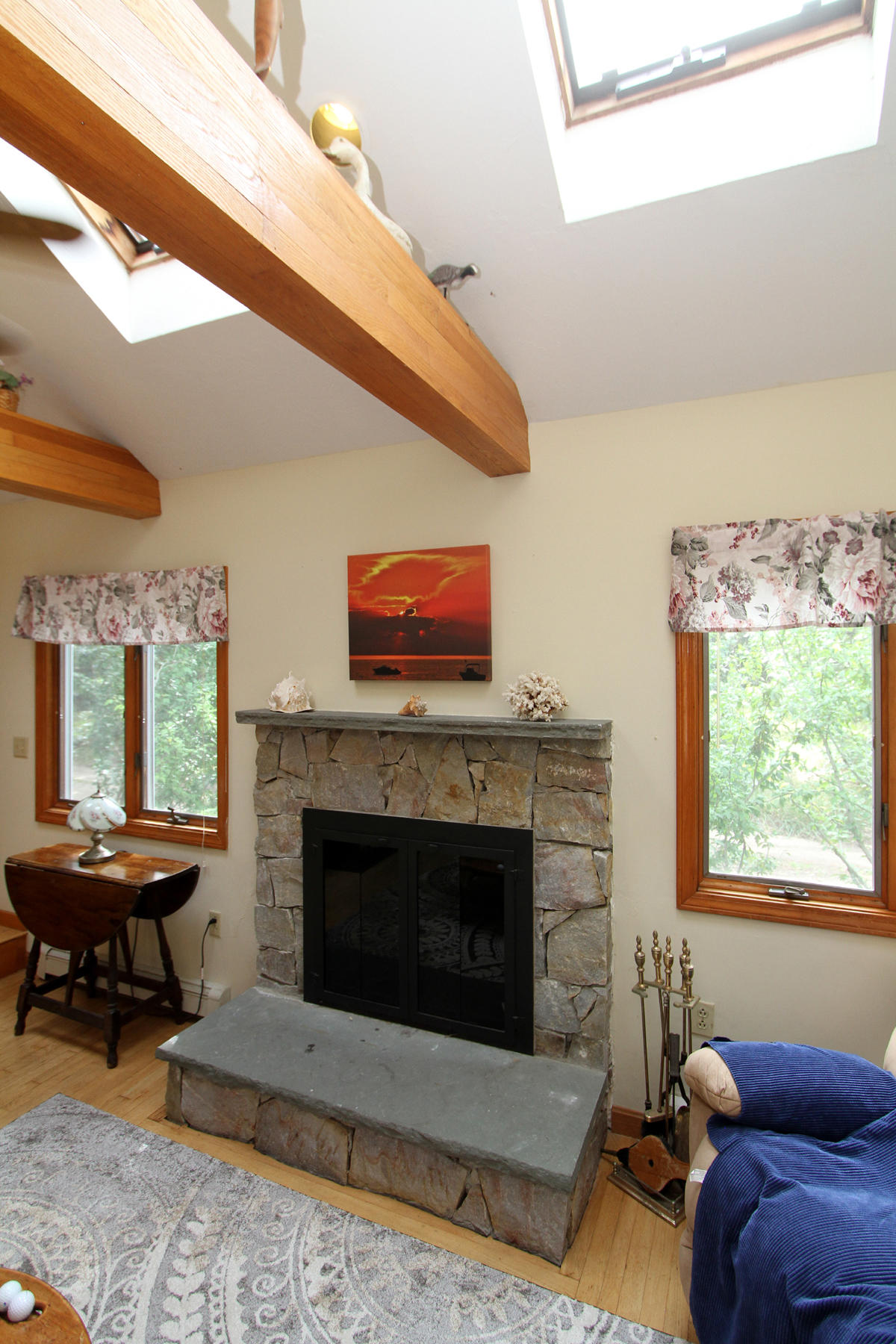 515 Steele Road Eastham, MA 02642 - Photo 8 of 33 Skylight /fireplace in living room