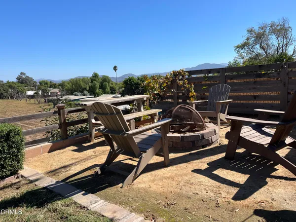 a view of a terrace with furniture
