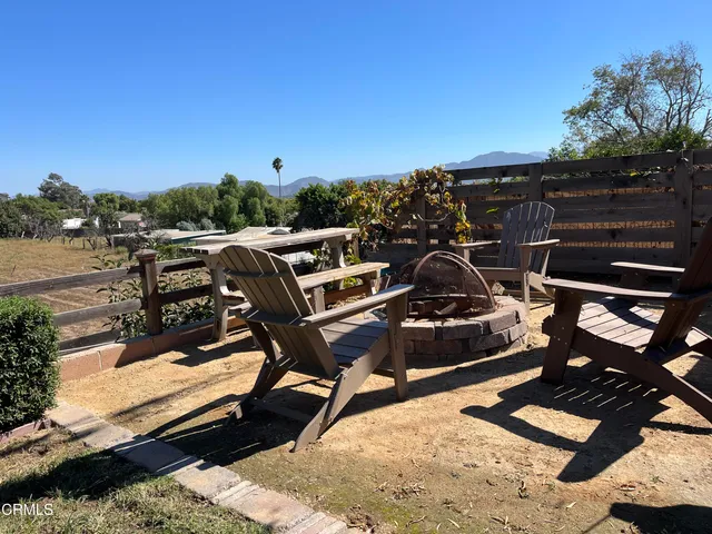 a view of a terrace with furniture