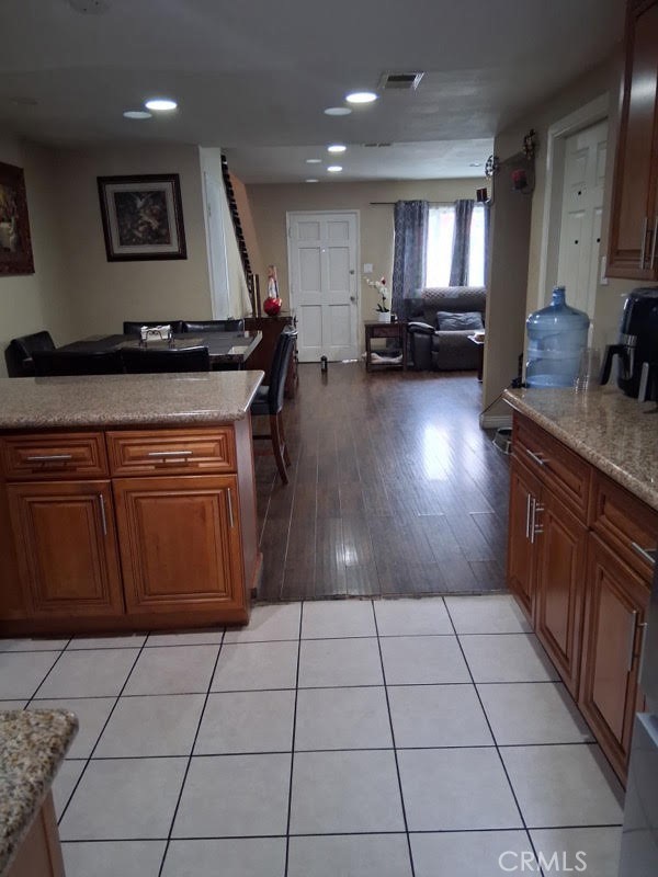 1777 Mitchell Avenue, Unit 29 Tustin, CA 92780 - Photo 22 of 26 a kitchen with a sink a counter top space and appliances