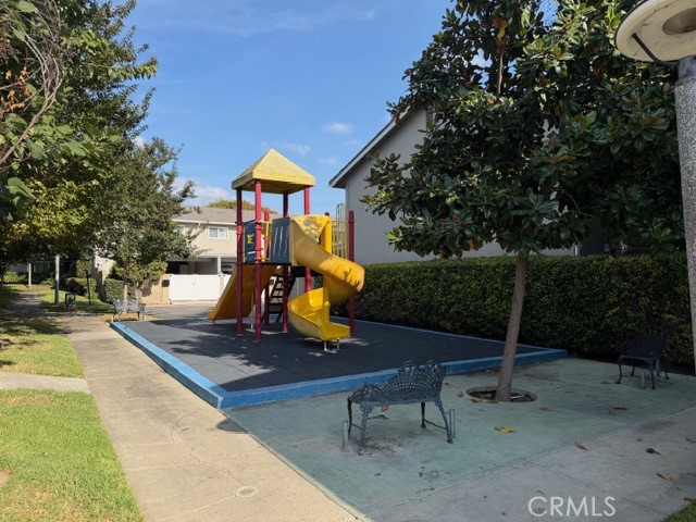 1777 Mitchell Avenue, Unit 29 Tustin, CA 92780 - Photo 23 of 26 a bench is sitting in the middle of a park