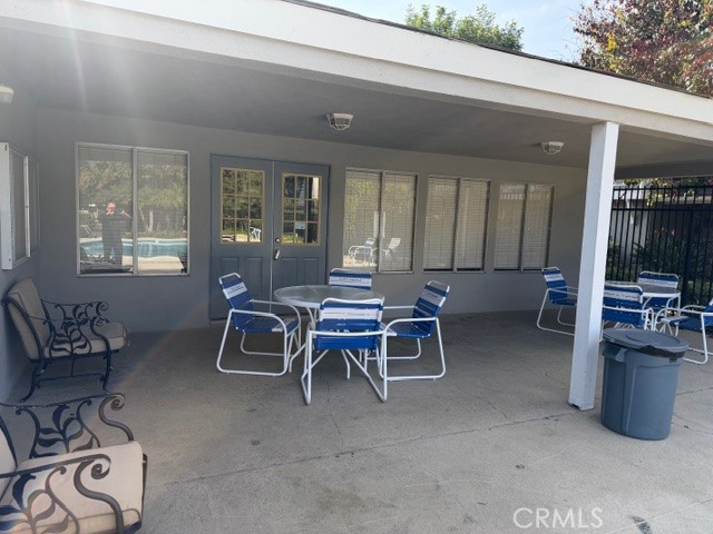1777 Mitchell Avenue, Unit 29 Tustin, CA 92780 - Photo 25 of 26 a dining room with furniture and windows