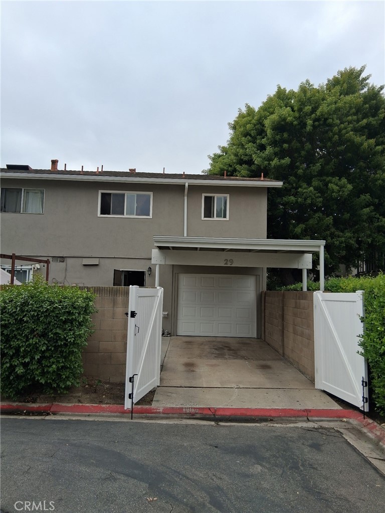 1777 Mitchell Avenue, Unit 29 Tustin, CA 92780 - Photo 7 of 26 a house with a outdoor space