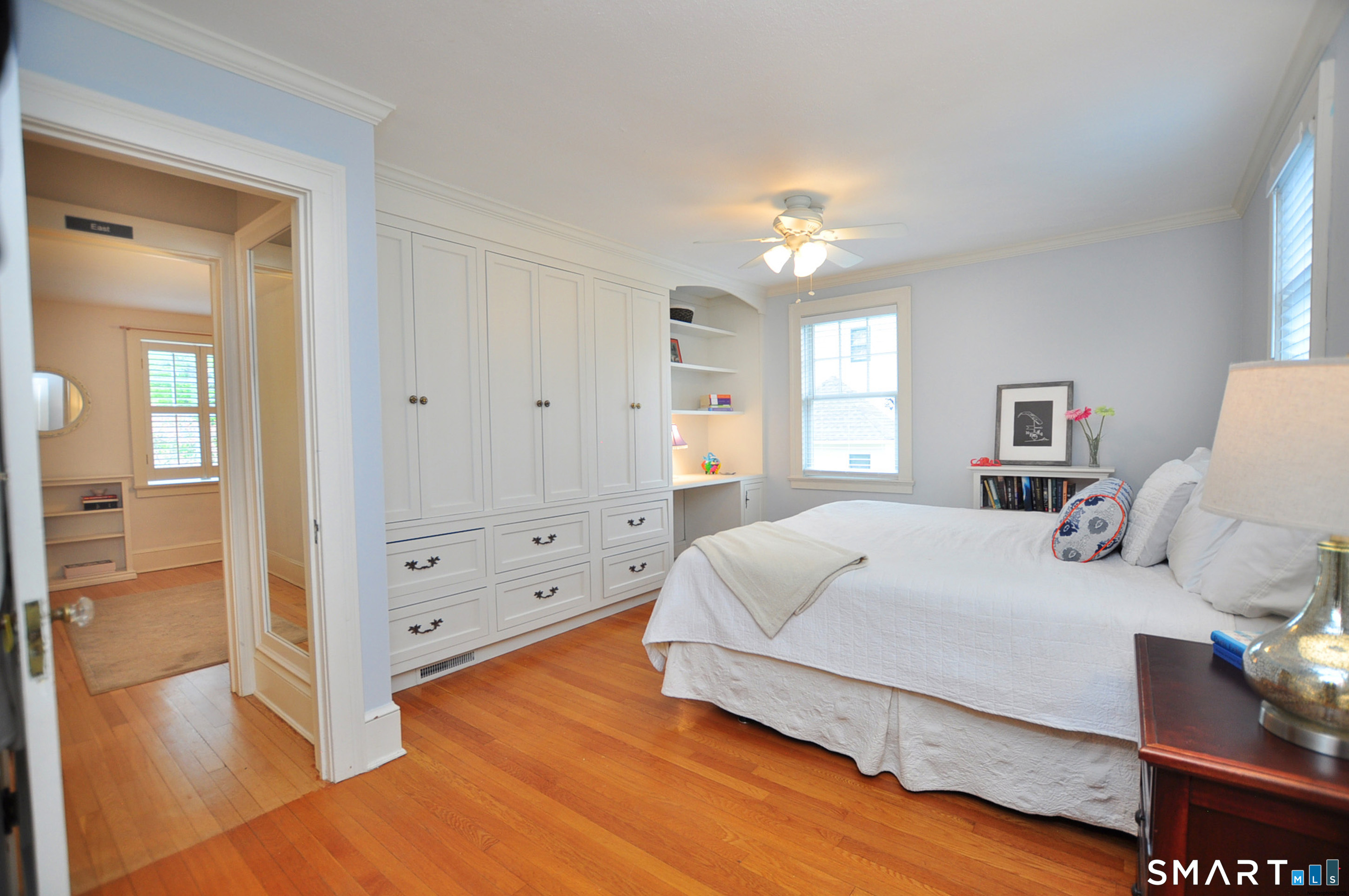 371 North Main Street Suffield, CT 06078 - Photo 29 of 39 a bedroom with a bed and a chandelier