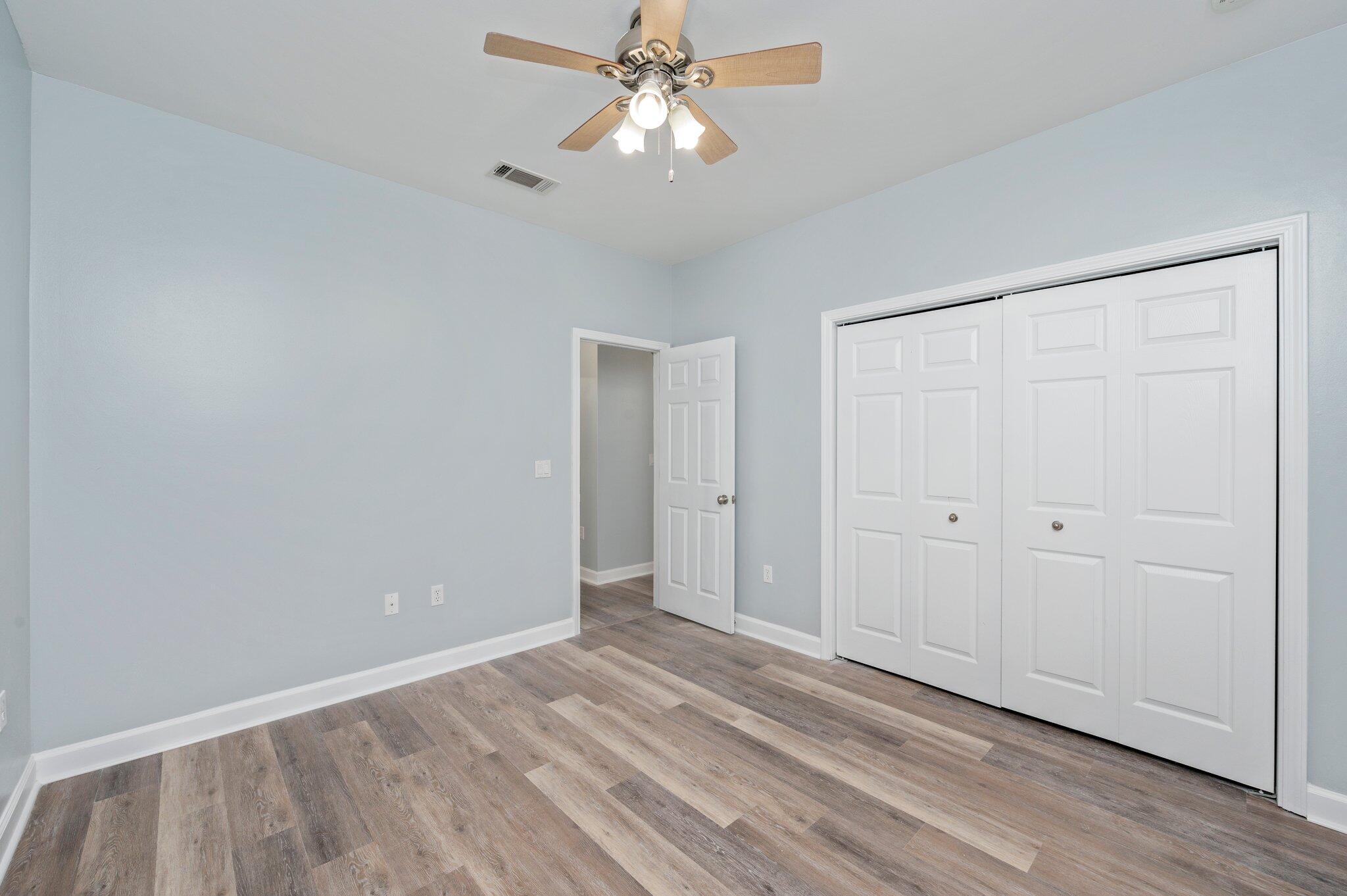 6082 Robin Road Crestview, FL 32539 - Photo 30 of 45 a view of an empty room and chandelier fan
