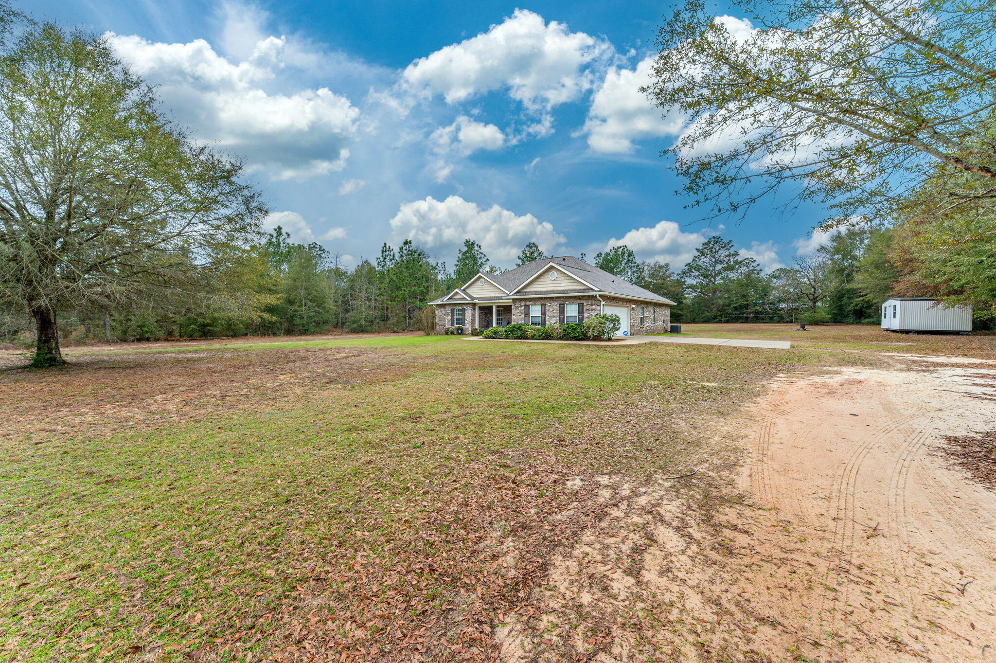 6082 Robin Road Crestview, FL 32539 - Photo 3 of 45 a view of an outdoor space and a yard