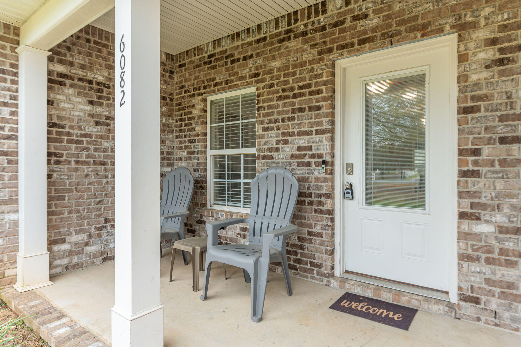 6082 Robin Road Crestview, FL 32539 - Photo 6 of 45 a view of a chair and table in a room