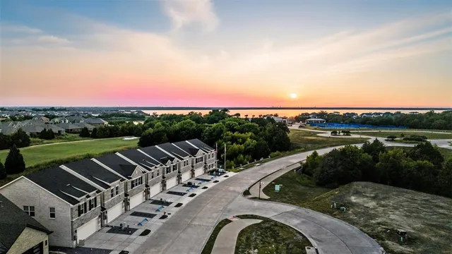 a view of a lake with a yard