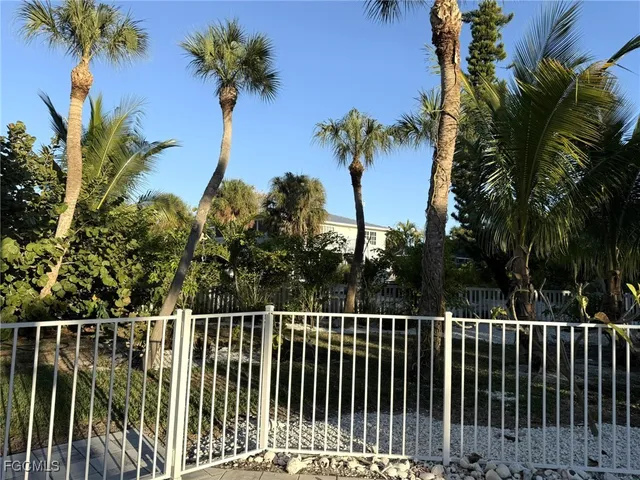 a view of balcony with furniture and wooden deck