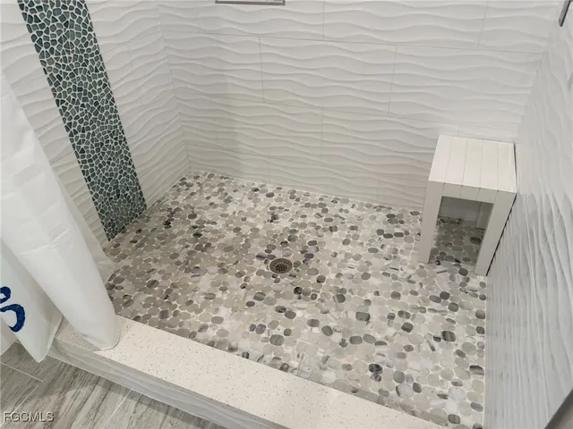 a bathroom with a toilet and a sink