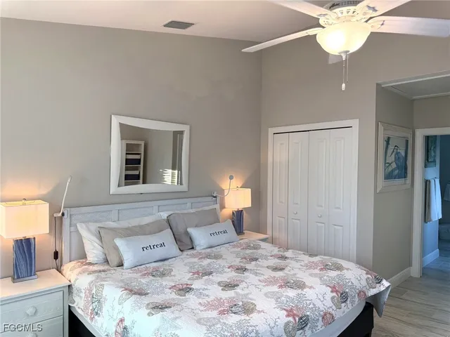 wooden floor in an empty room and a window