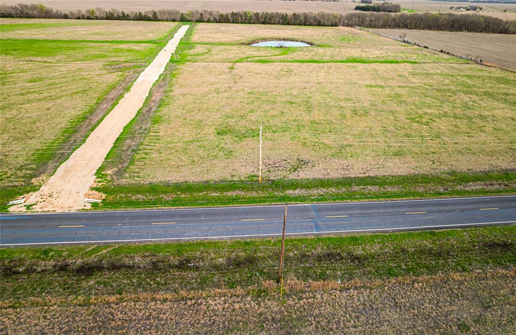 Lot 15 Farm Road Blossom, TX 75416 - Photo 3 of 5 a view of an ocean beach