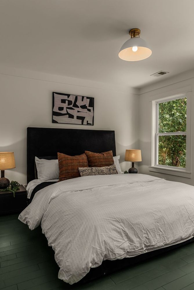 9581 South Harpeth Road Nashville, TN 37221 - Photo 31 of 55 a bedroom with a bed and a window