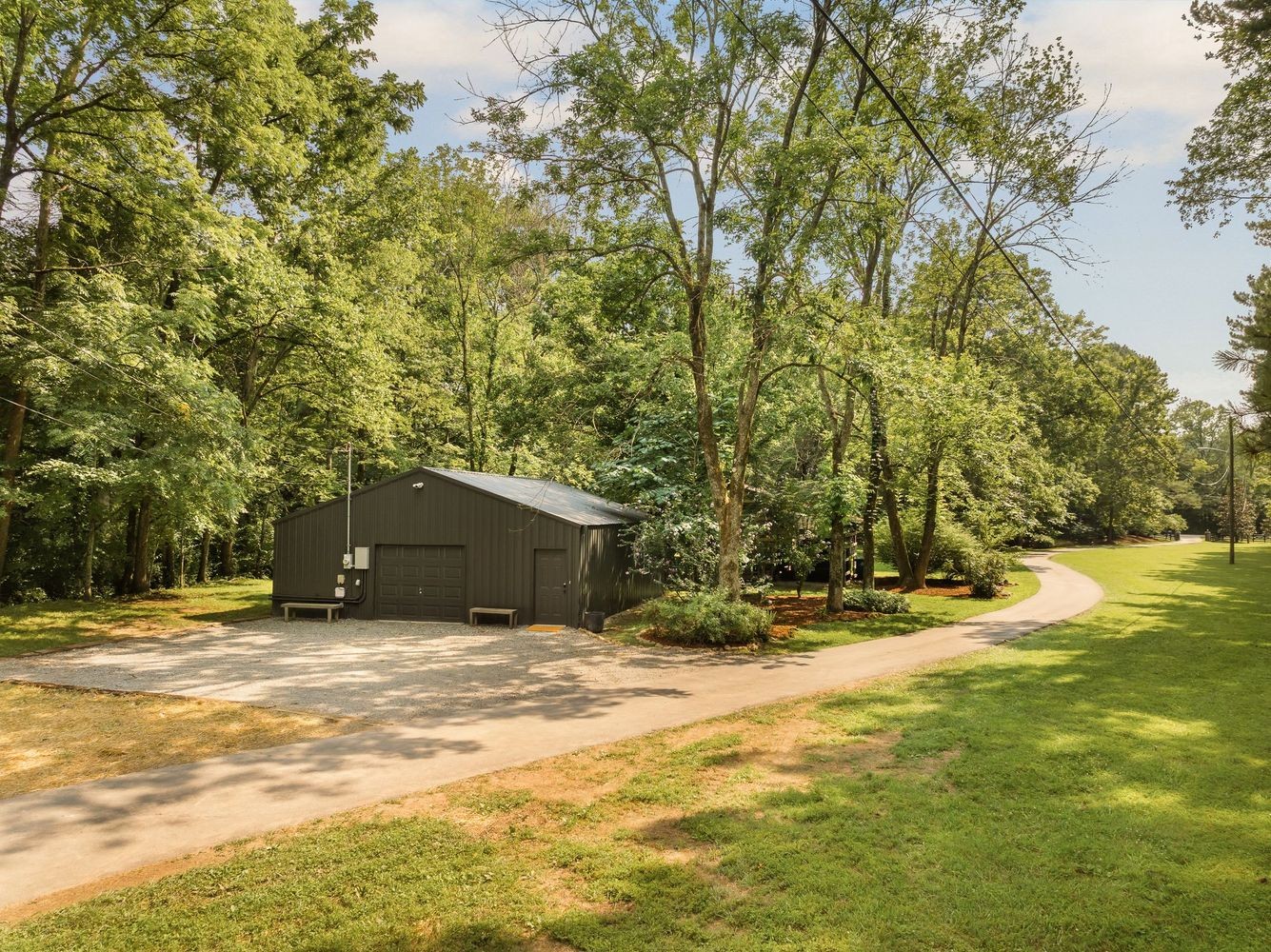 9581 South Harpeth Road Nashville, TN 37221 - Photo 54 of 55 a view of a house with a yard