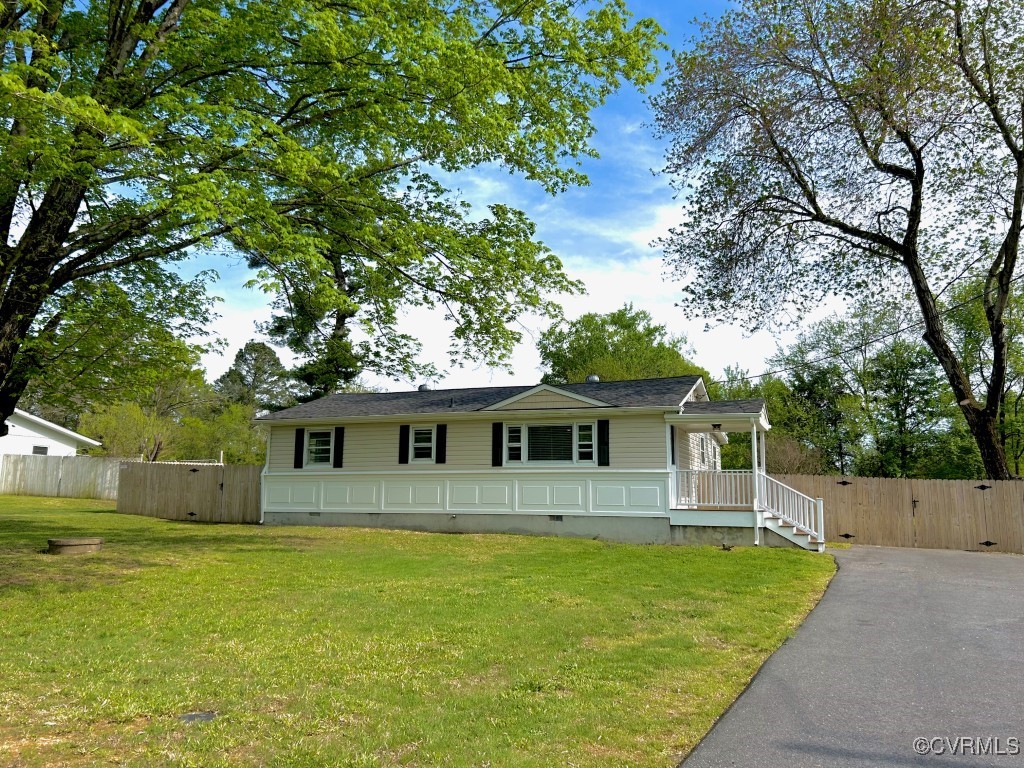 2721 Perlock Road Richmond, VA 23237 - Photo 1 of 27 View of front facade featuring a front yard, crawl