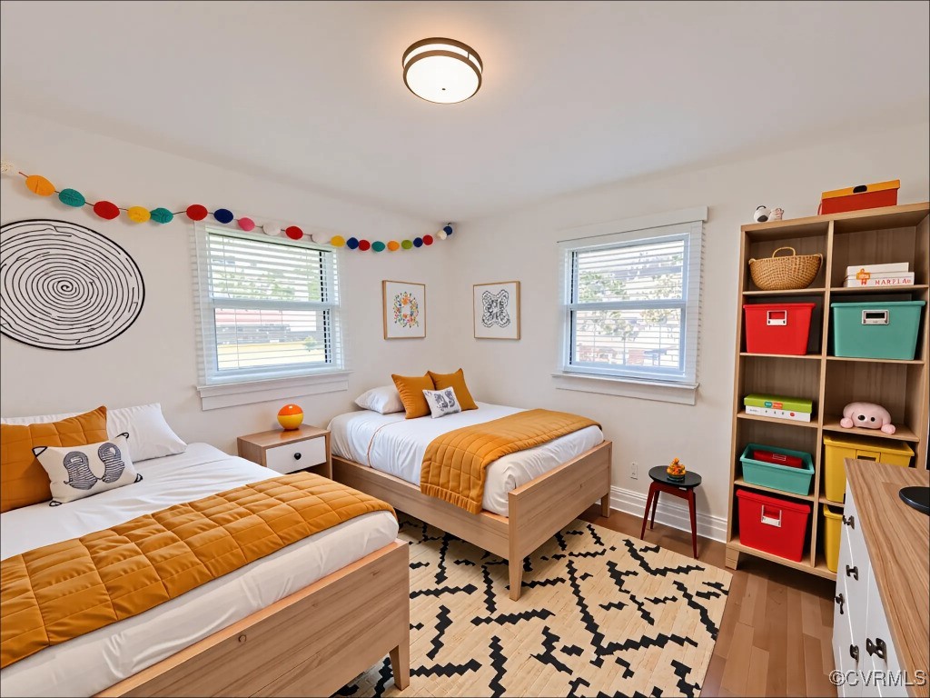 2721 Perlock Road Richmond, VA 23237 - Photo 11 of 27 Bedroom featuring baseboards, multiple windows, an