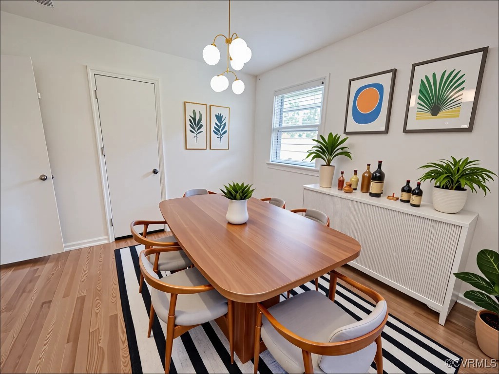 2721 Perlock Road Richmond, VA 23237 - Photo 15 of 27 Dining room with radiator, baseboards, and light w
