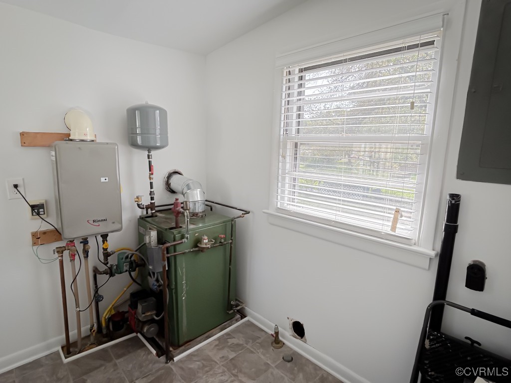 2721 Perlock Road Richmond, VA 23237 - Photo 21 of 27 Utility room with a heating unit, tankless water h