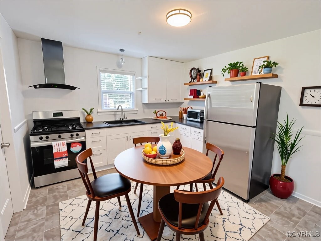 2721 Perlock Road Richmond, VA 23237 - Photo 5 of 27 Kitchen featuring wall chimney range hood, open sh
