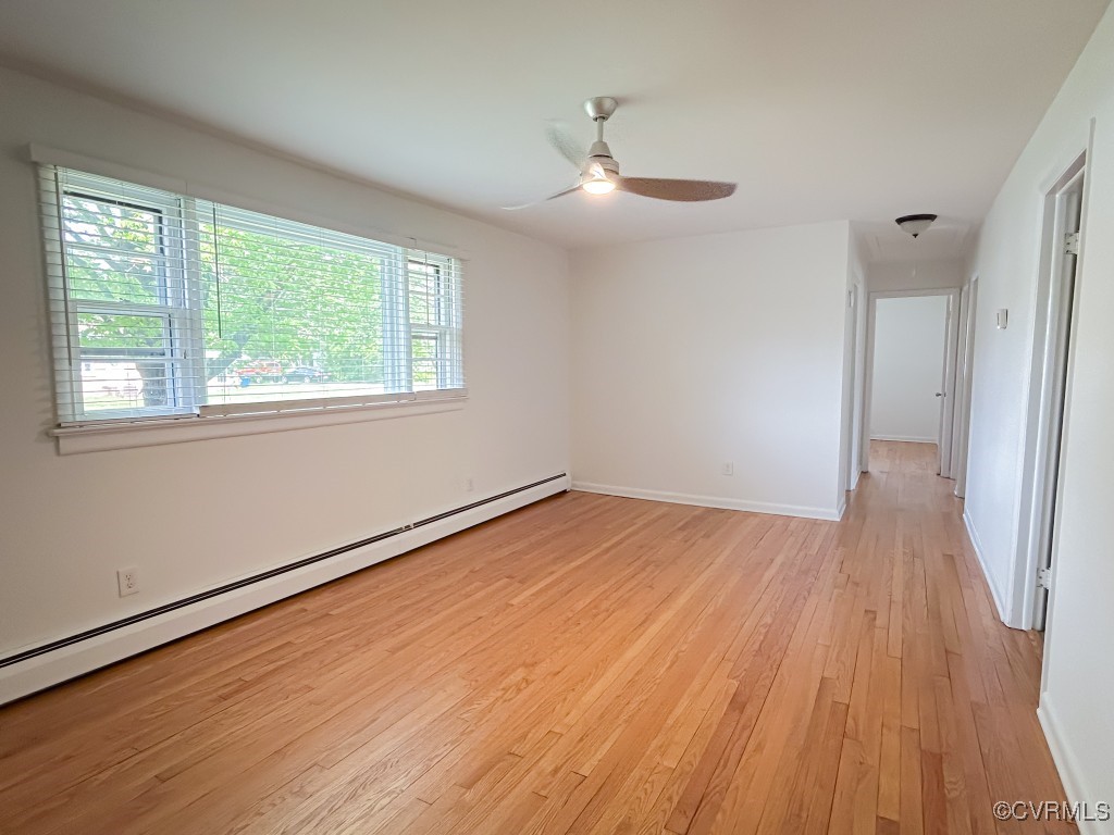 2721 Perlock Road Richmond, VA 23237 - Photo 7 of 27 Empty room featuring ceiling fan, attic access, ba