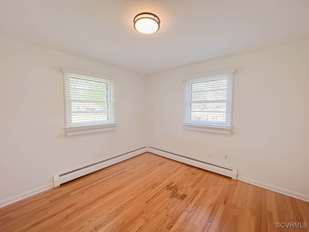 2721 Perlock Road Richmond, VA 23237 - Photo 10 of 27 Unfurnished room featuring baseboard heating, a ba