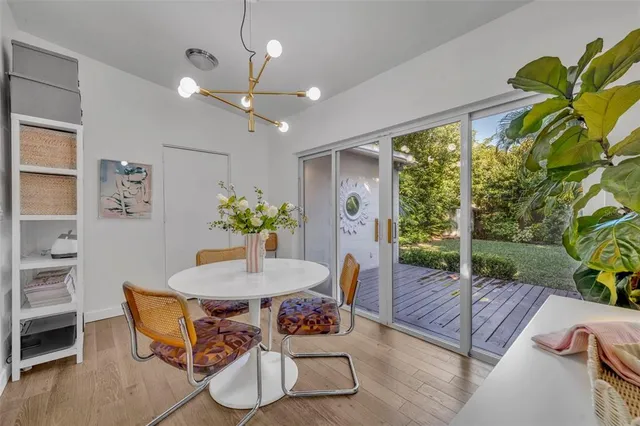 a view of a house with porch and wooden floor