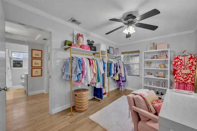 a view of a chairs and table in a back yard of the house