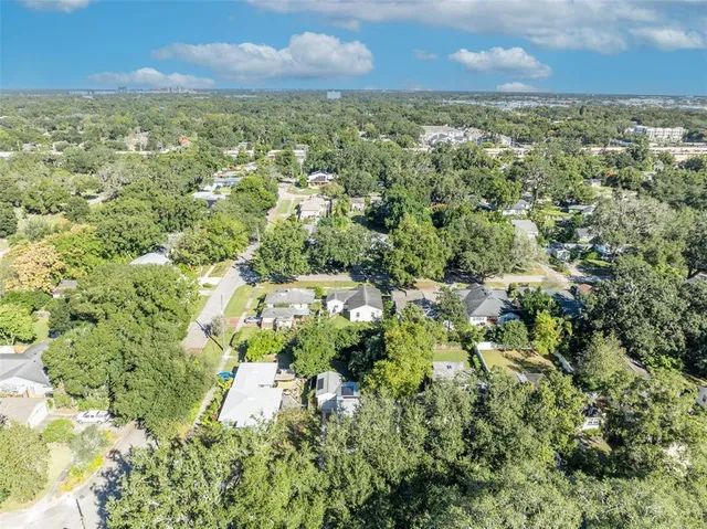 an aerial view of residential house with outdoor space