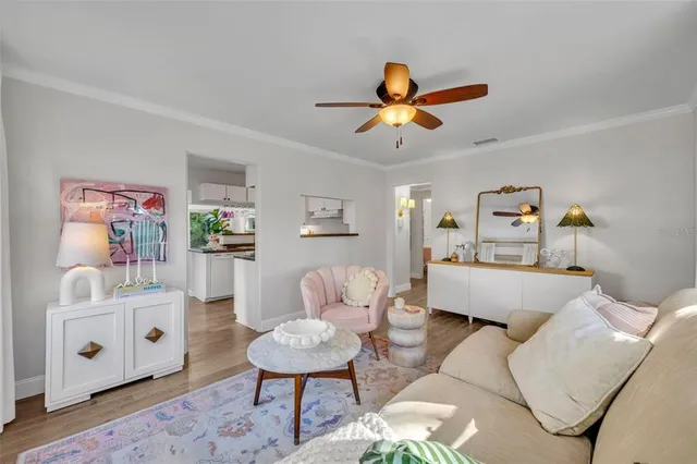 a kitchen with a sink and a refrigerator