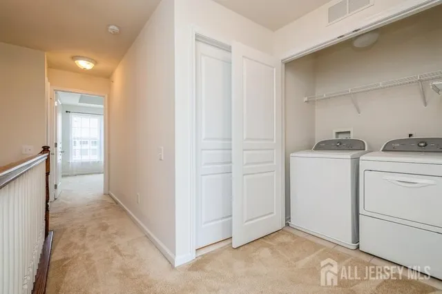 a view of a storage & utility room with closet