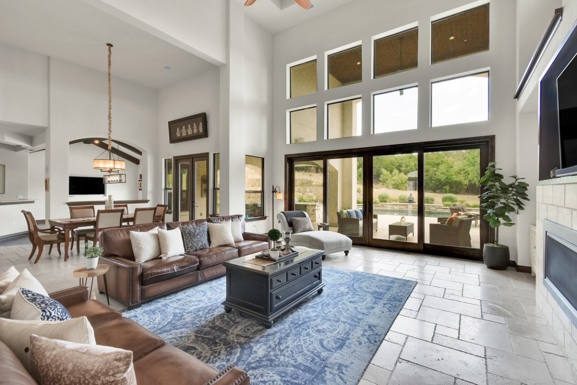 Main Living Area with huge windows and vaulted ceilings.