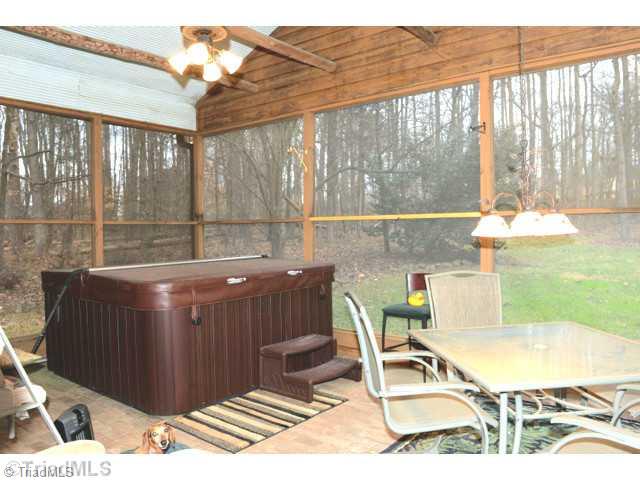 4705 Harvey Road Jamestown, NC 27282 - Photo 15 of 29 Screened Porch. Hot Tub does not stay with house