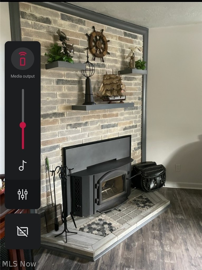3727 Rook Drive Akron, OH 44319 - Photo 23 of 29 Wood burning fireplace with electric blower