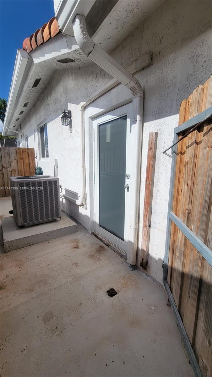 10172 Southwest 159th Avenue Miami, FL 33196 - Photo 2 of 10 a view of an empty room with stairs