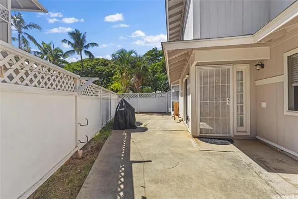 a view of a back yard of the house