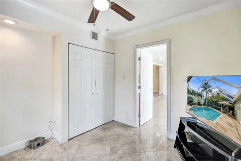 a room with furniture and a flat screen tv