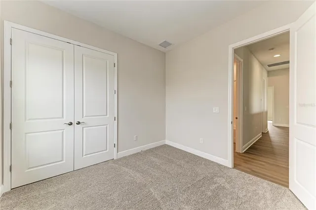a view of a room with a wardrobe space