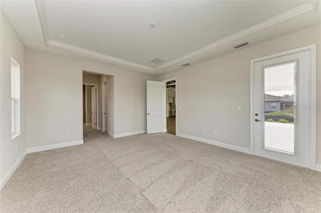 a view of an empty room and window