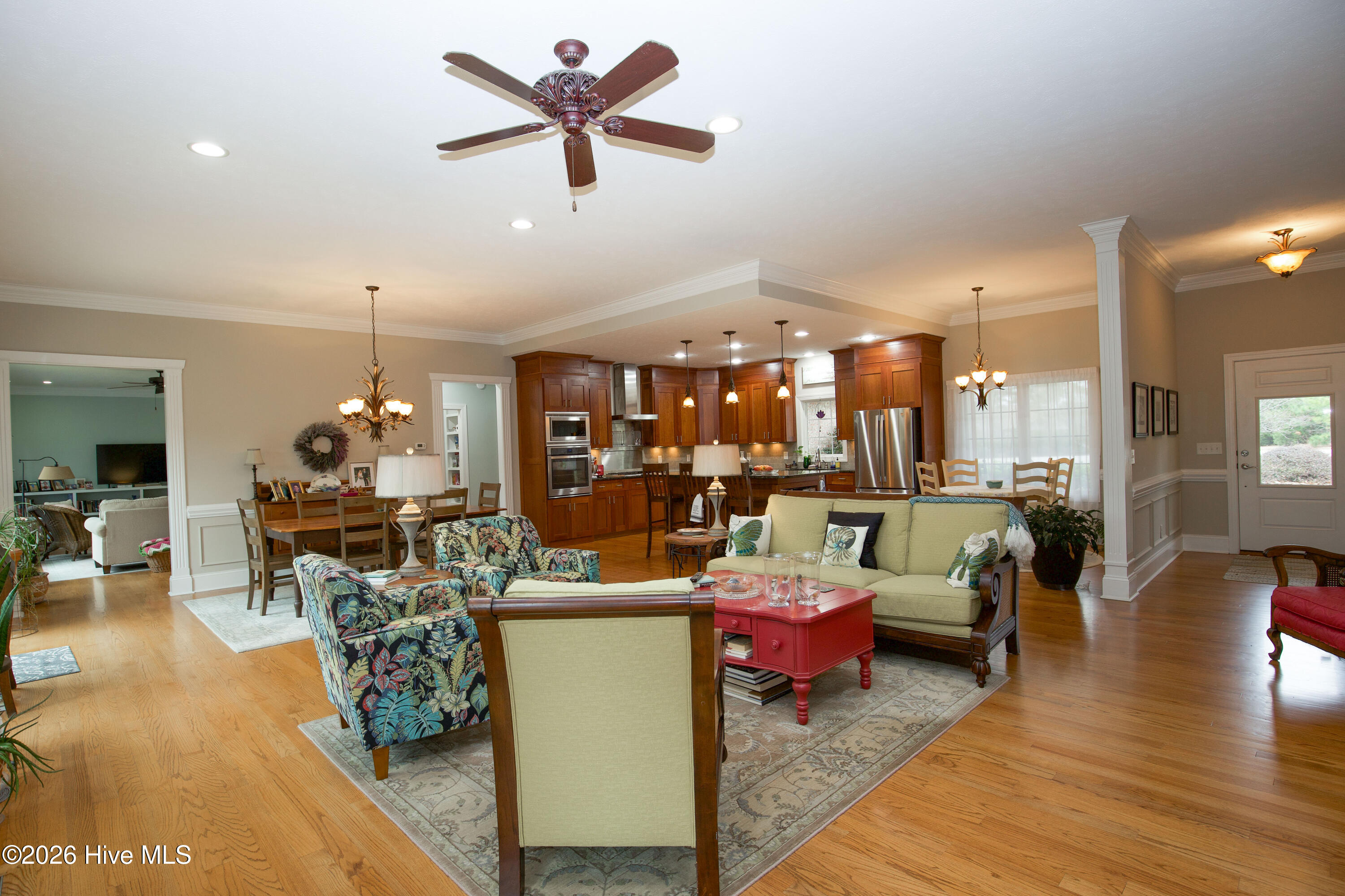 45 Richmond Road Jackson Springs, NC 27281 - Photo 11 of 93 view of the great room, as seen from the entrance area to the primary bedroom. Study/Den can be seen to the left, followed tby the formal dining area. great room is in the middle and kitchen can be seen straight ahead and to the far right is the entrance foyer.