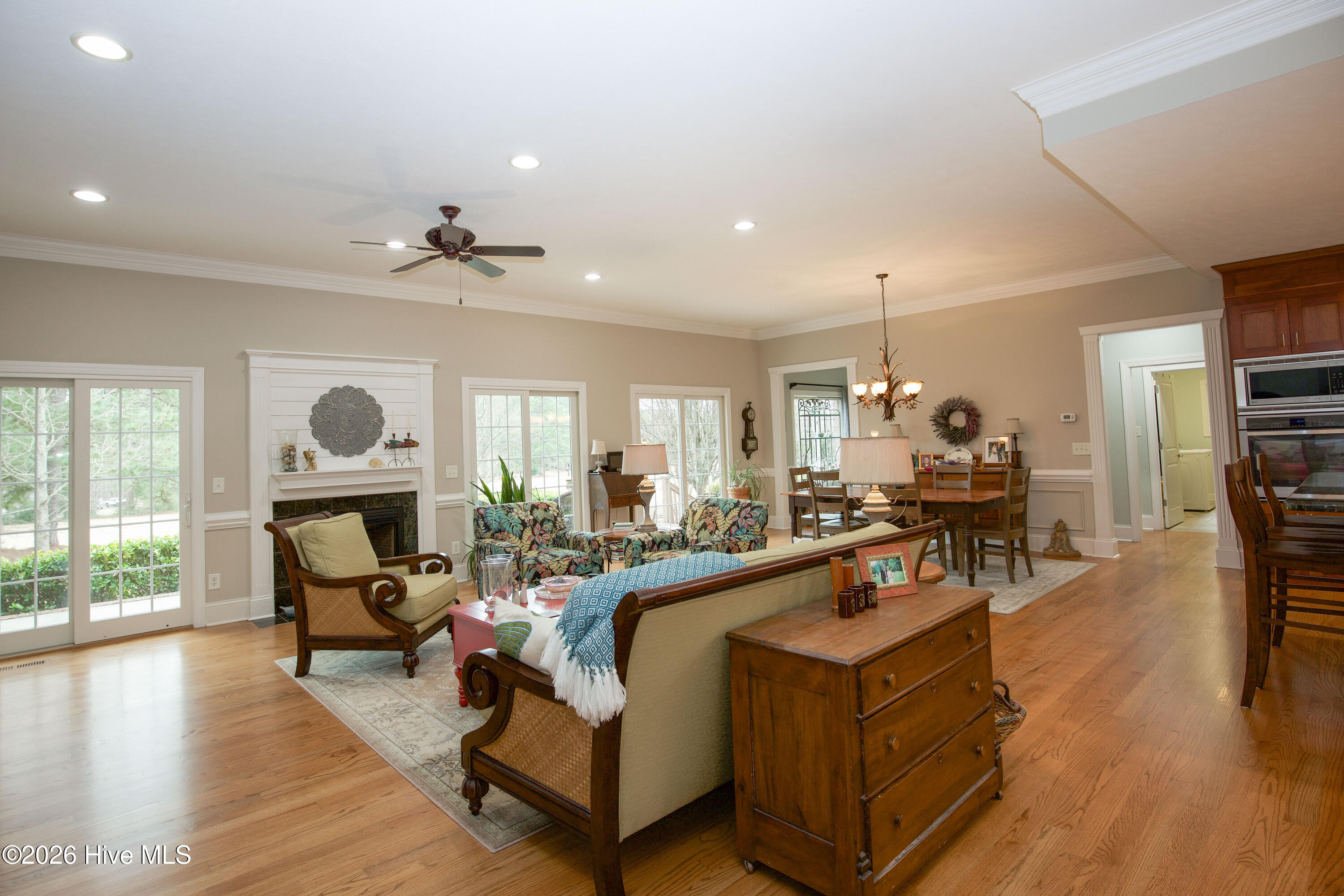 45 Richmond Road Jackson Springs, NC 27281 - Photo 10 of 93 View of great room. Study/Den is the door left furhtermost interrior door way and the hallway leading to the laundry room and powerder room is the doorway to the right a portion.
