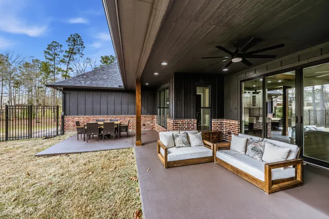 a view of a patio with wooden floor