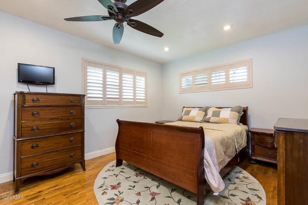 4238 Adam Road Simi Valley, CA 93063 - Photo 13 of 35 a bedroom with a bed and a window