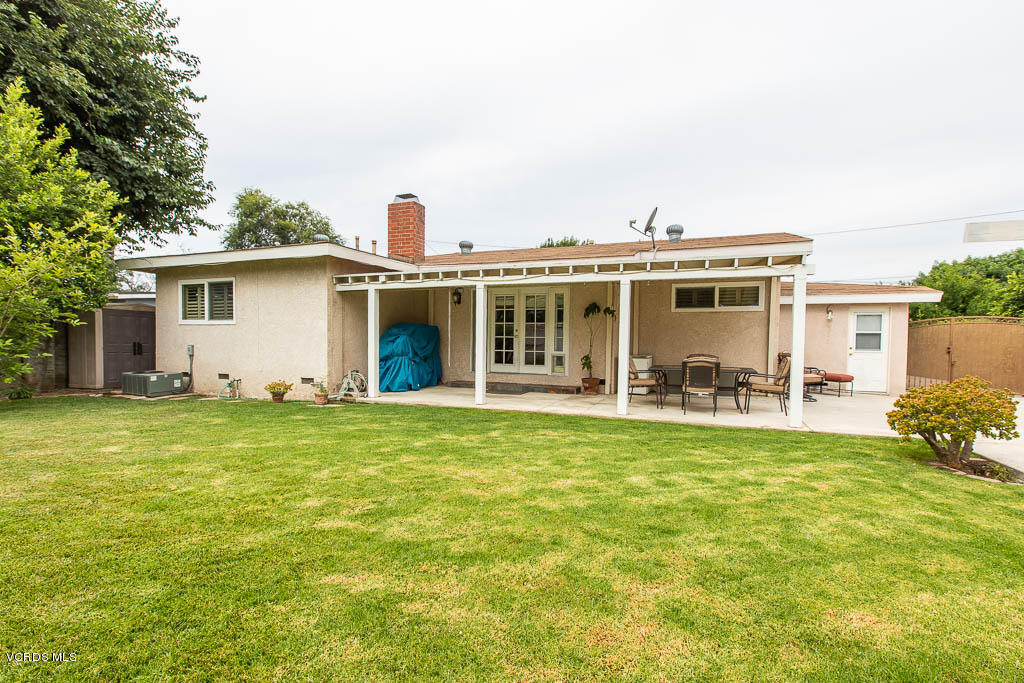 4238 Adam Road Simi Valley, CA 93063 - Photo 20 of 35 a view of a house with a backyard