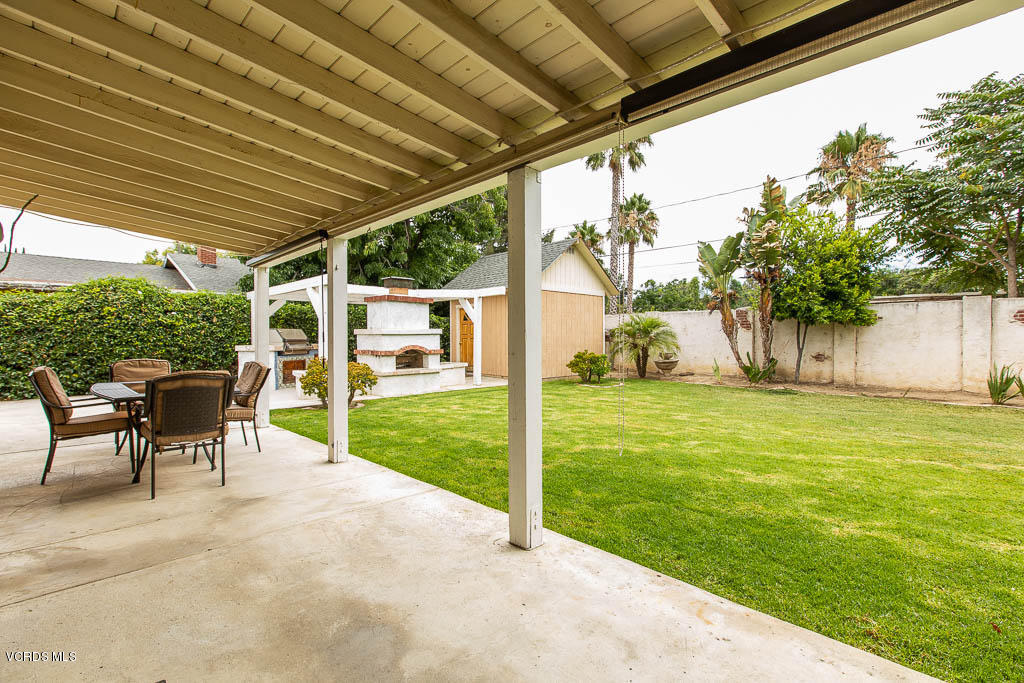 4238 Adam Road Simi Valley, CA 93063 - Photo 26 of 35 a view of a patio with table and chairs and potted plants