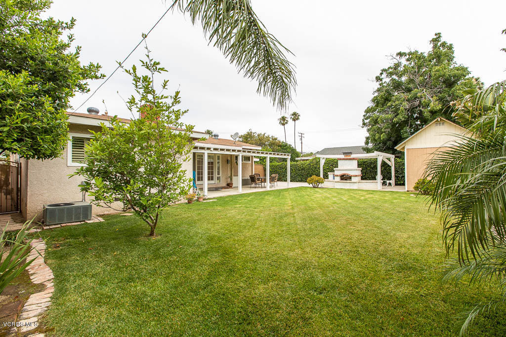 4238 Adam Road Simi Valley, CA 93063 - Photo 28 of 35 a front view of a house with a garden