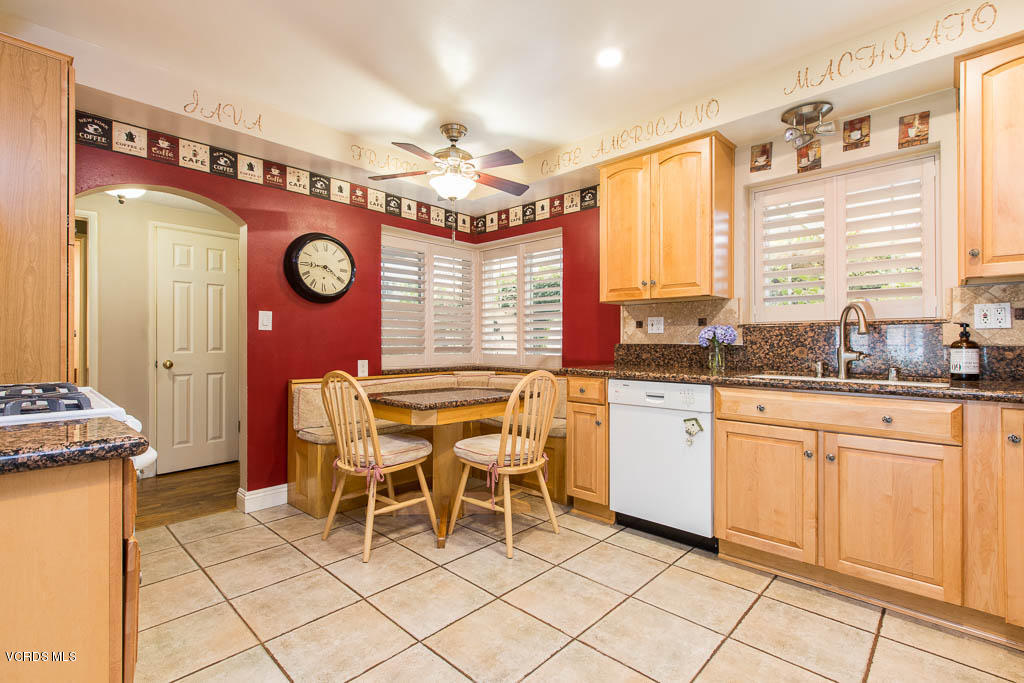 4238 Adam Road Simi Valley, CA 93063 - Photo 6 of 35 a kitchen with a cabinets and chandelier