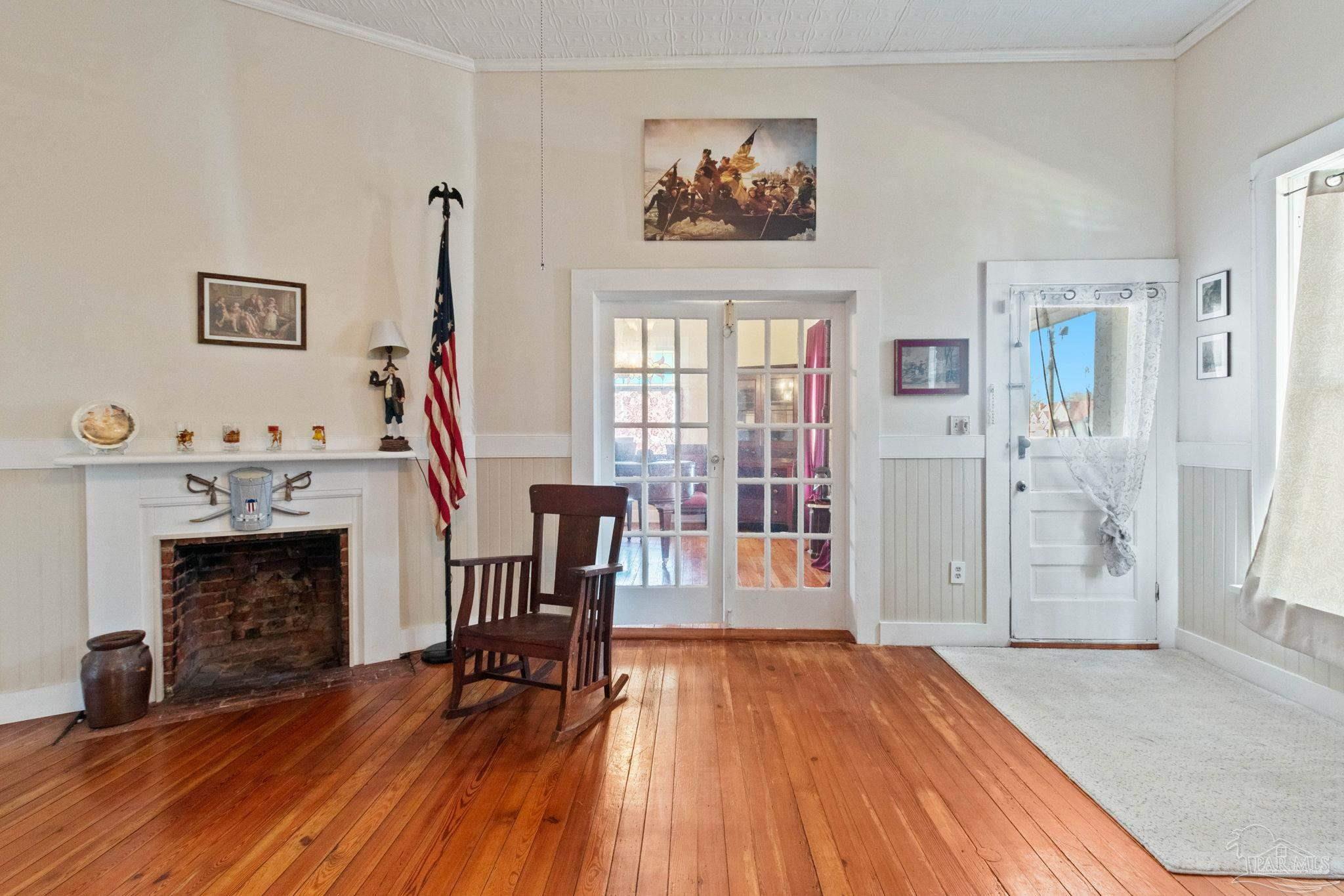 309 South Main Street Atmore, AL 36502 - Photo 15 of 47 a view of a livingroom with furniture and a fireplace