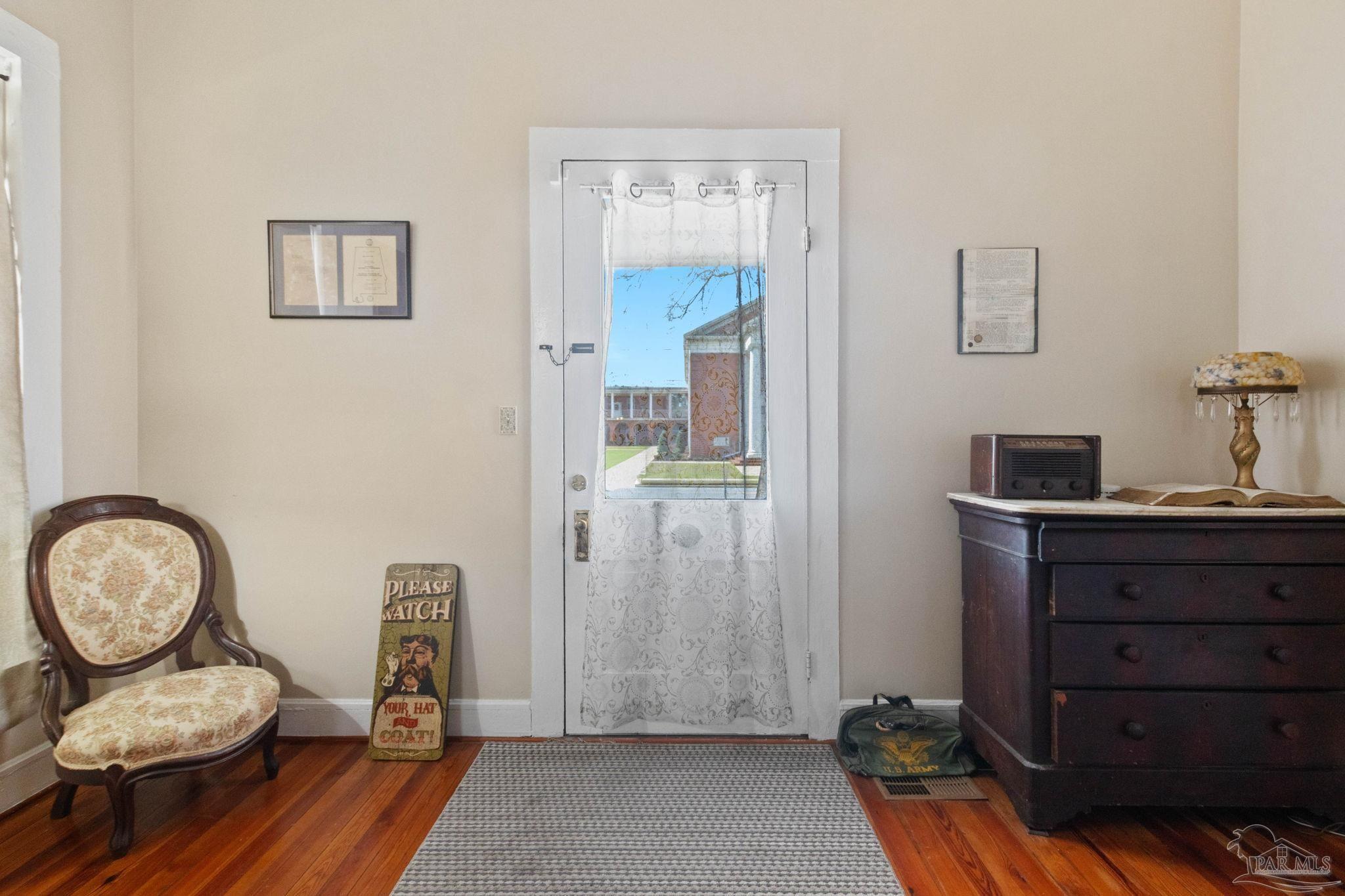 309 South Main Street Atmore, AL 36502 - Photo 5 of 47 a view of a hallway with entryway